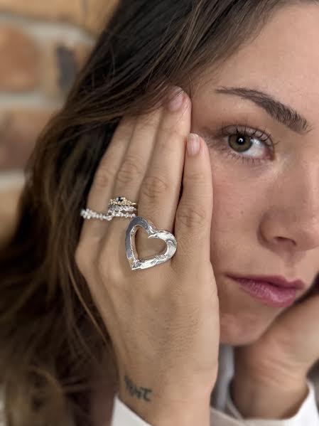 Larger than love ring