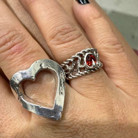 Larger than love ring