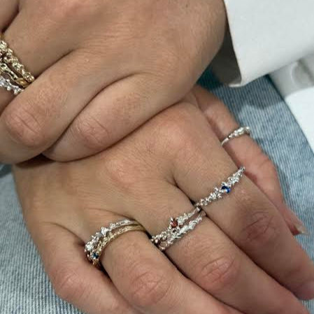 stacked element rings in silver and gold
