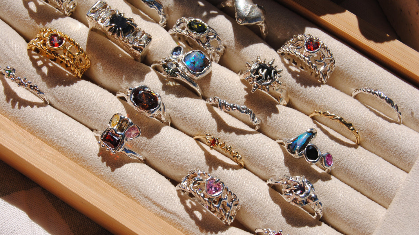 tray of handmade jewellery with semi precious gems