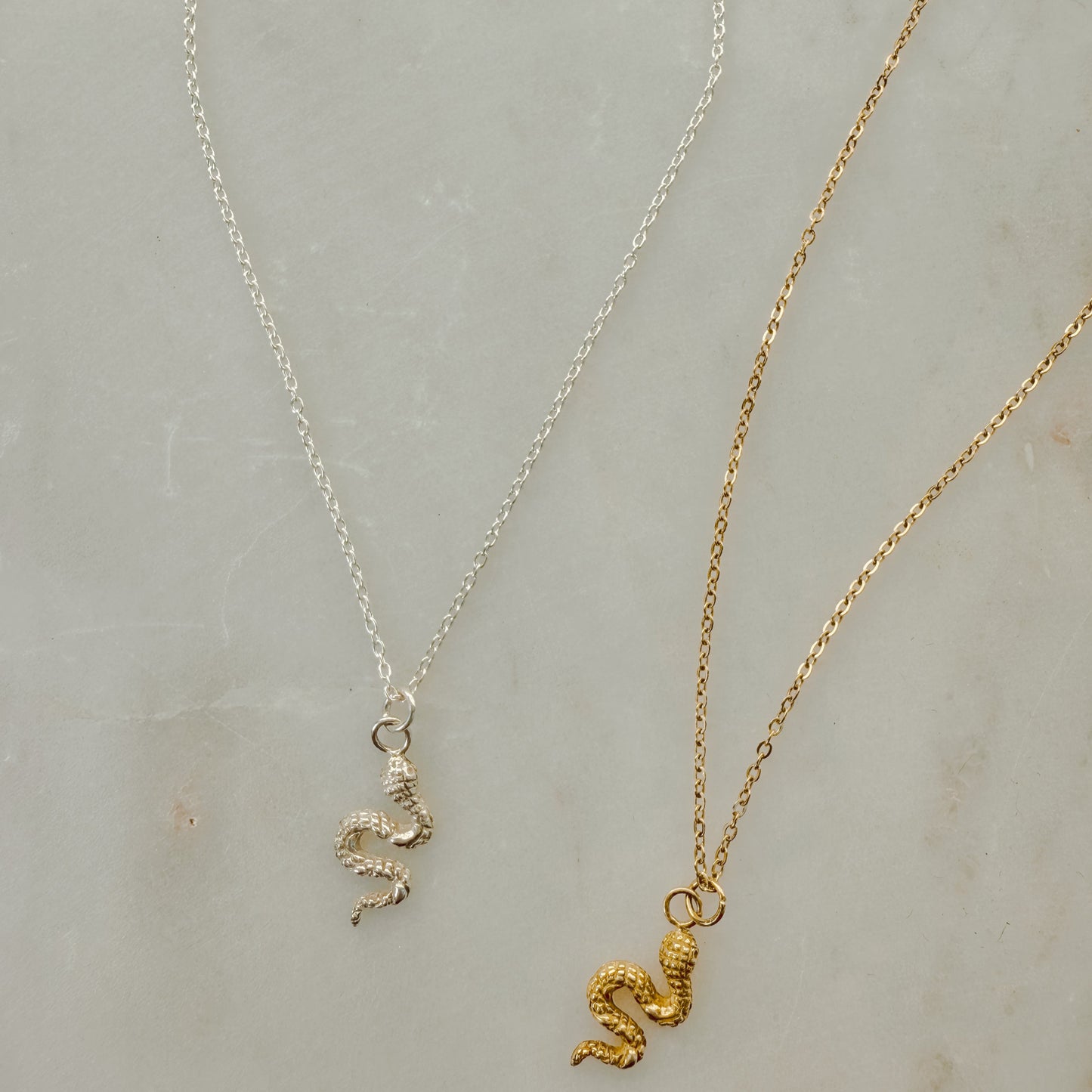 mini snake pedants on necklace you can choose from silver or gold vermeil