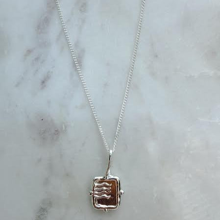 water element necklace handmade in silver on a dainty silver chain, zodiac necklace