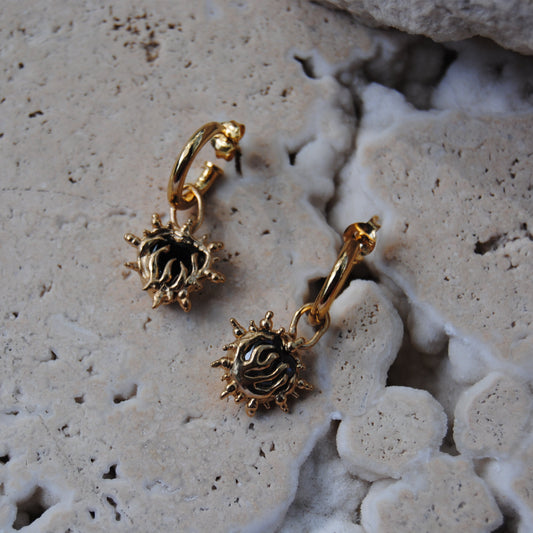 our flame heart hoops in gold