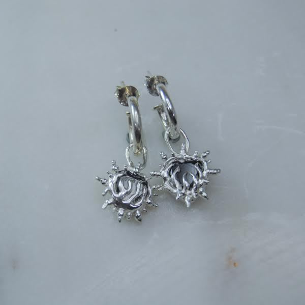 heart shaped gem huggie earrings with flames