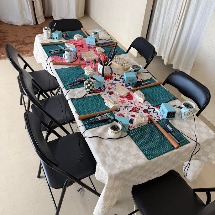 sip and jewel workshop table set up