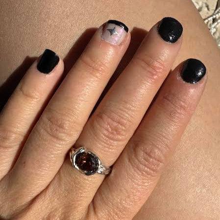 Oval swirl ring